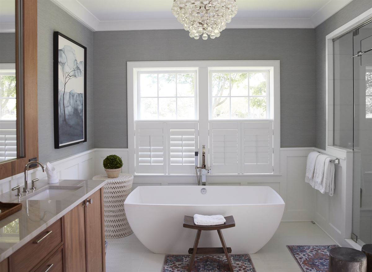 Finished spa bathroom with soaking tub, chandelier and walk-in shower