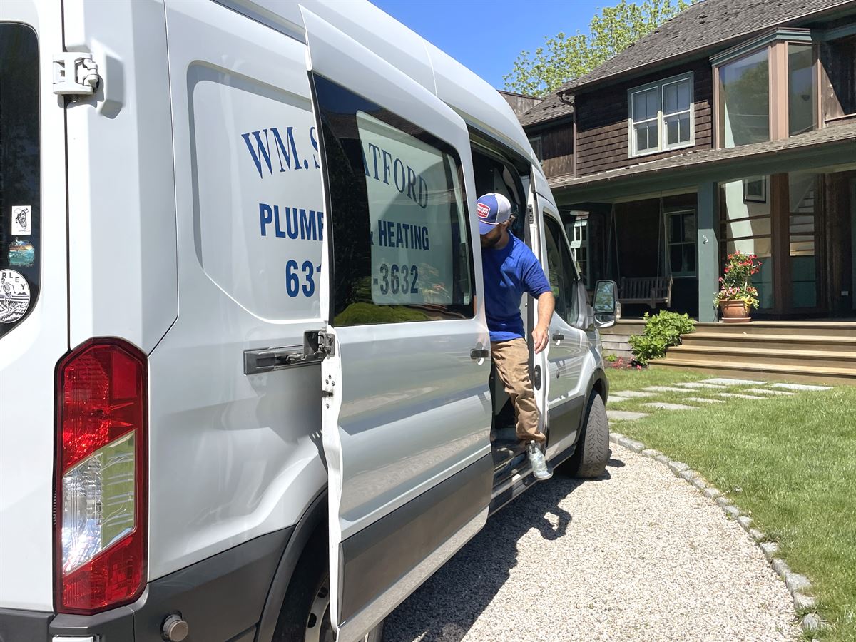 Technician with the Stratford service truck near Mecox