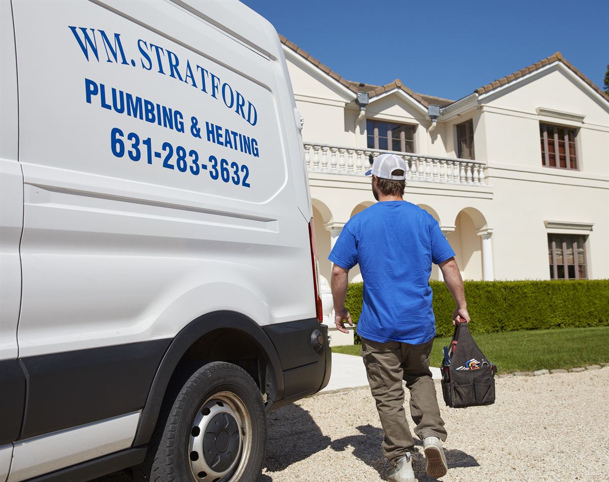 Stratford Plumbing technician arriving at a Long Island estate
